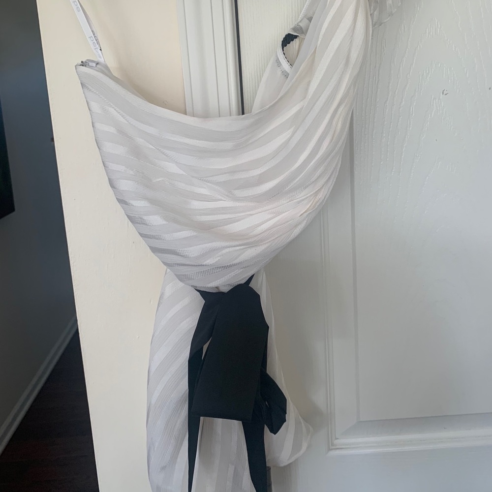 One shoulder brand new Bebe top.